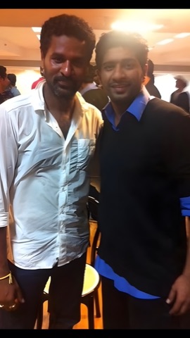 A young photo of our founder backstage with Prabhu Deva