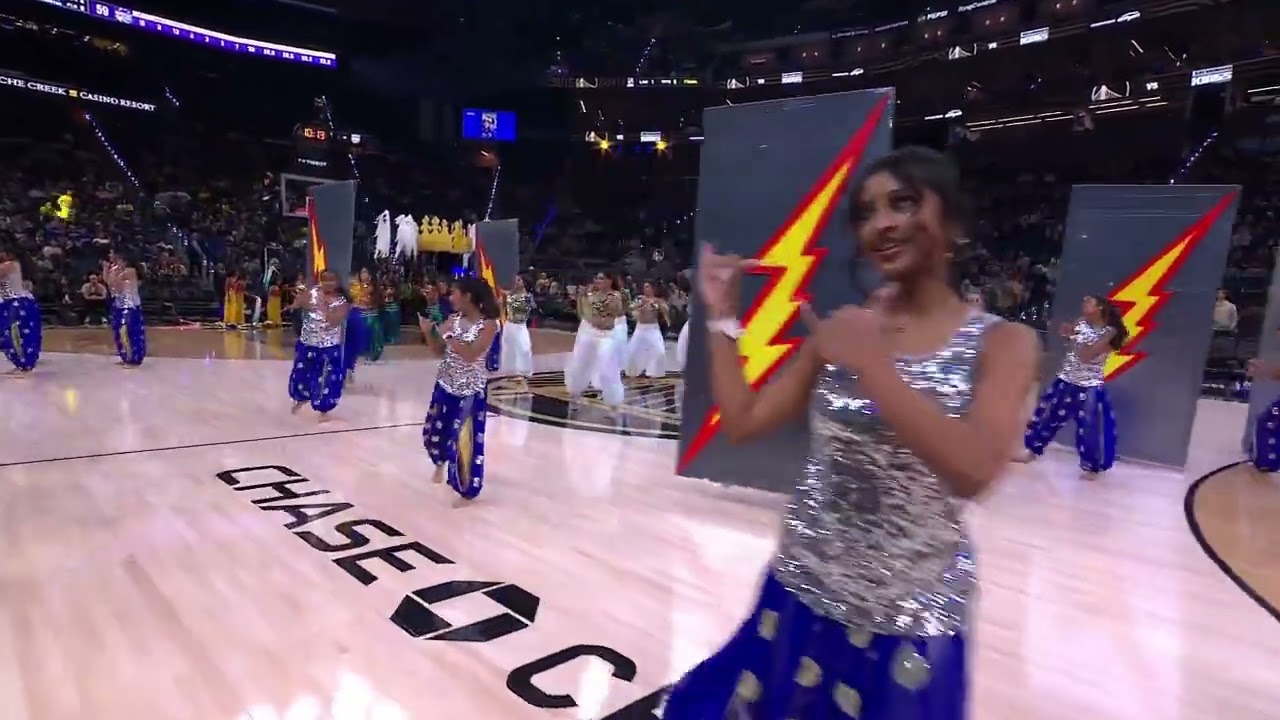 TKOB dancers performing on the Chase Center court